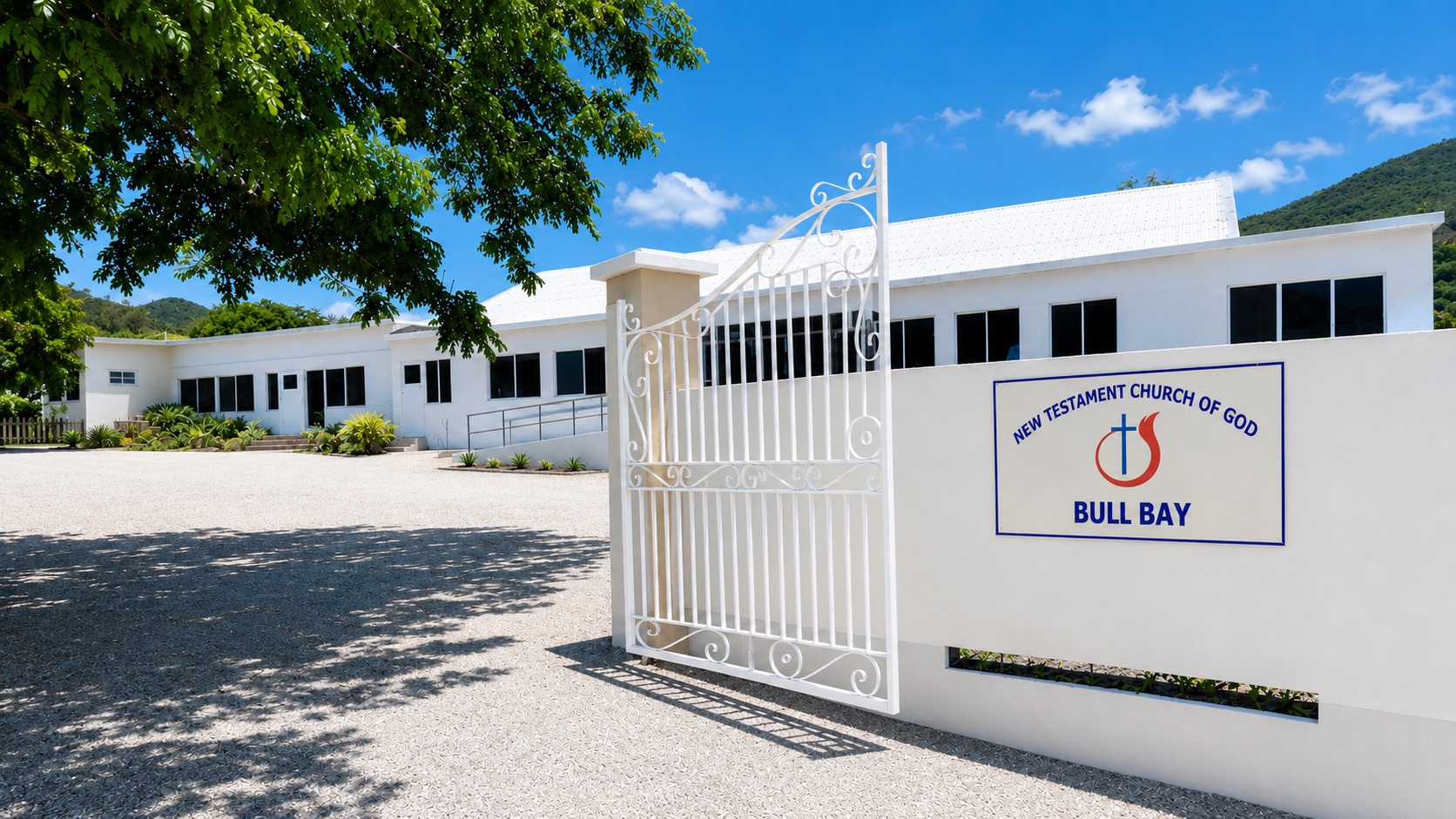 Entrance and sign of New Testament Church of God, Bull Bay